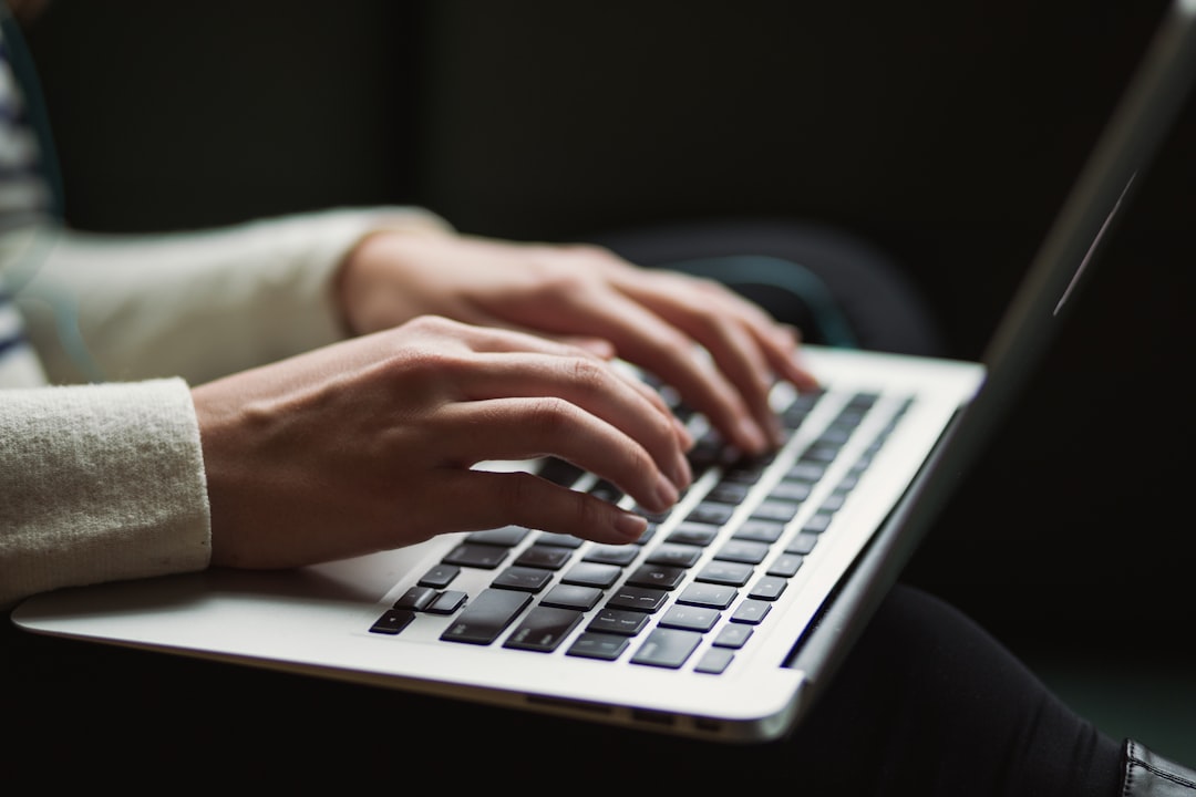 Photo Blogger at laptop